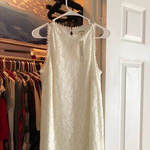 White dress drops right above the knees